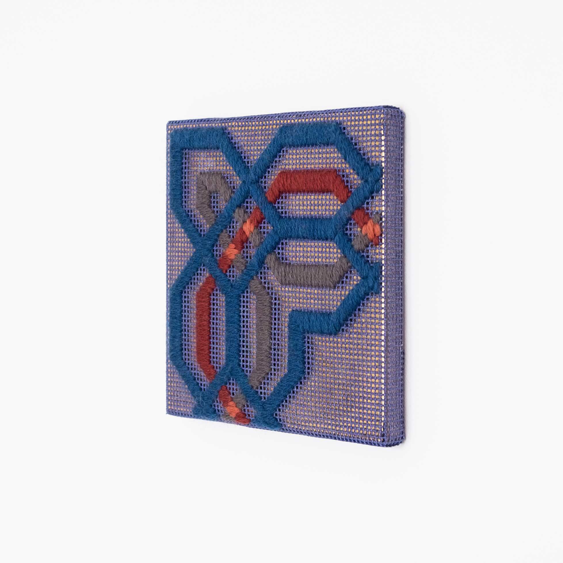 Border fragment [blue-grey-red on blue], Hand-embroidered wool thread and acrylic paint on canvas over gilded panel, 2021
