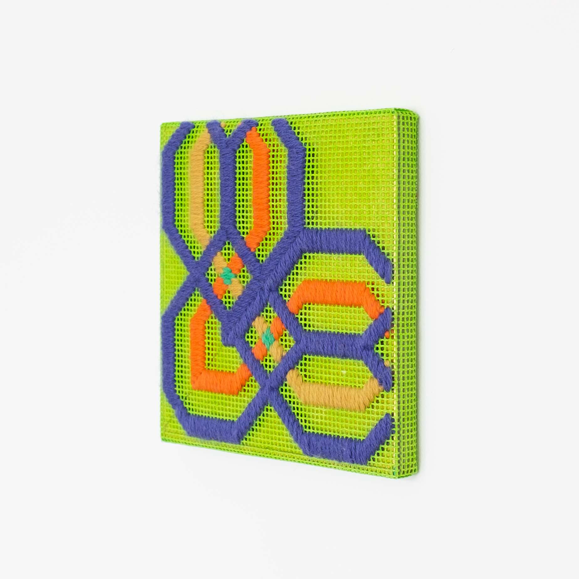 Border fragment [purple-orange-yellow on green], Hand-embroidered wool thread and acrylic paint on canvas over gilded panel, 2021