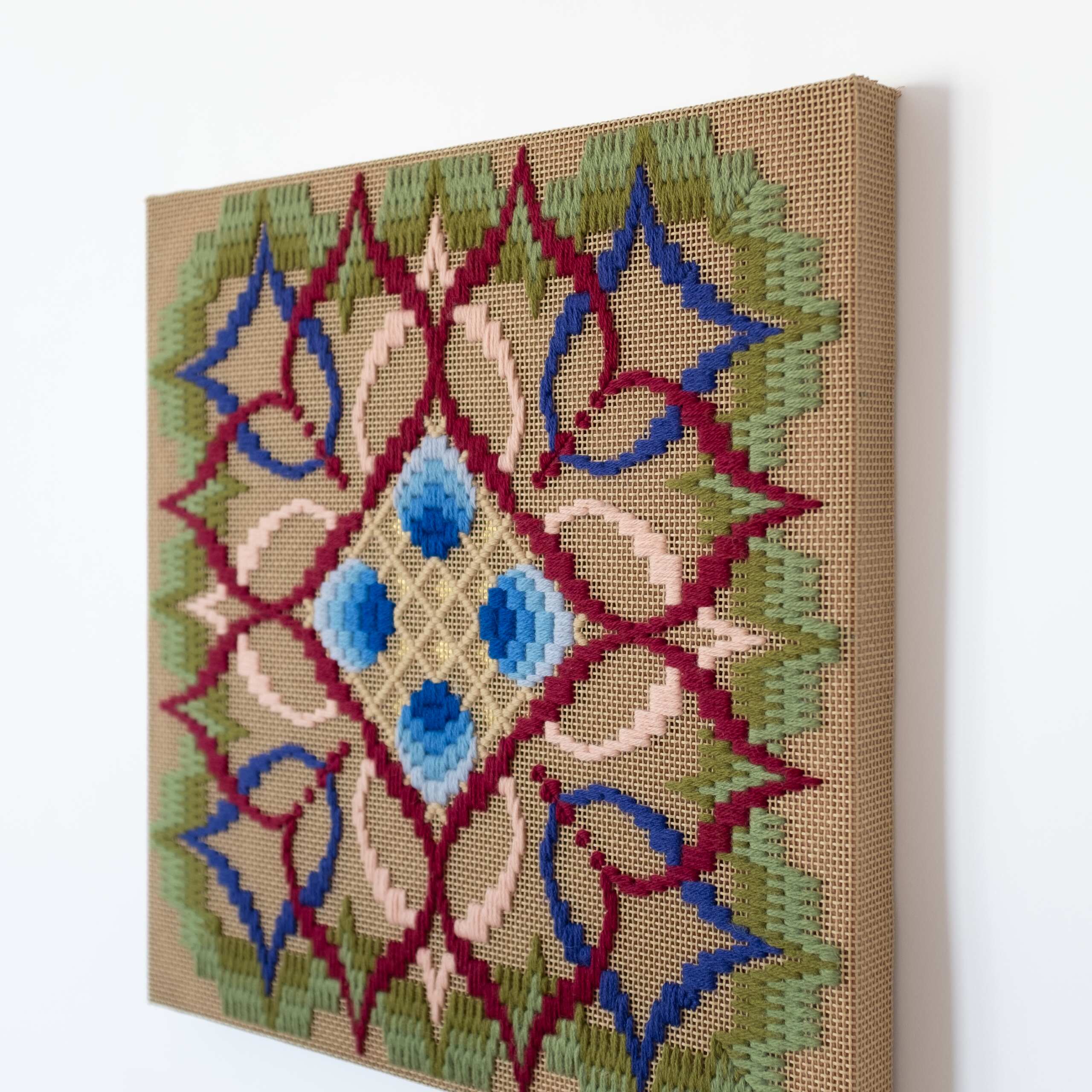 The flower of what's true [blue], Hand-embroidered wool yarn on cotton canvas over cedar panel, 24-carat gold leaf, 2024